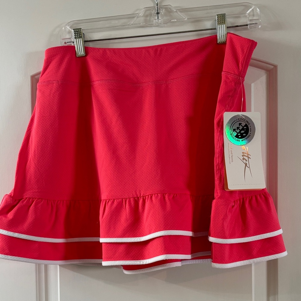 NWT bright coral tennis skirt